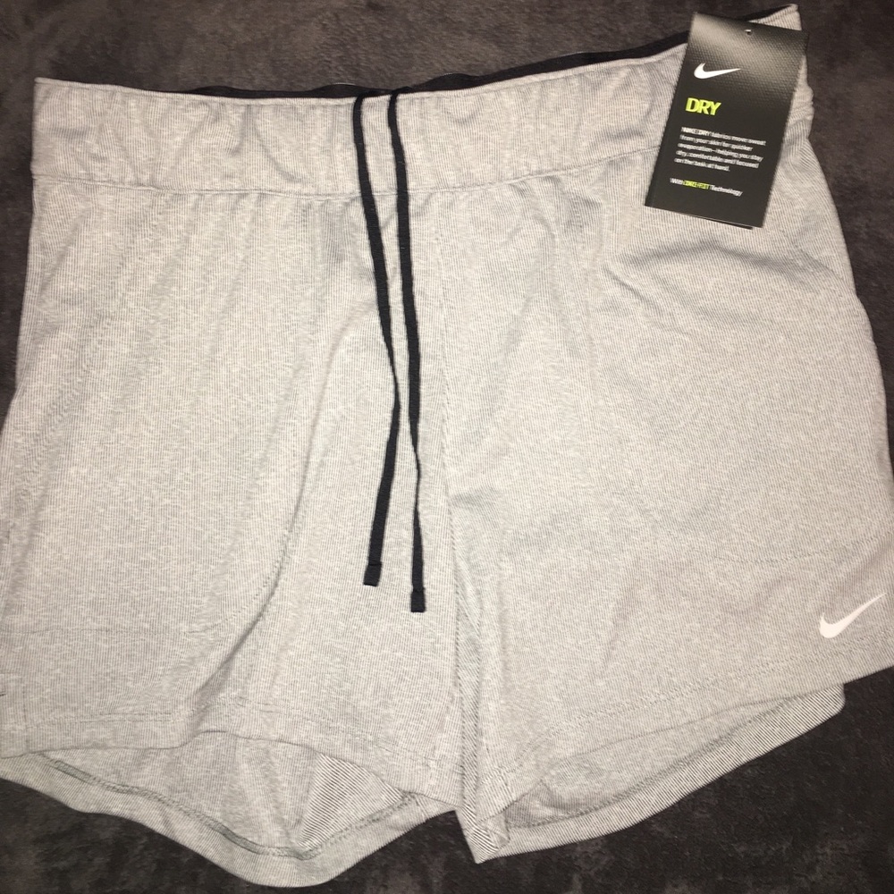 Grey and white striped nike shorts